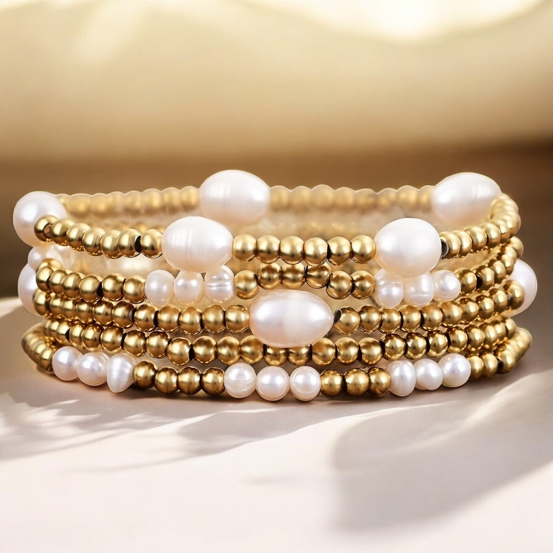Armband-Set aus Gold und Perlen