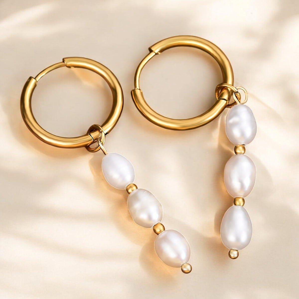Boucles d'oreilles créoles en perles de cascade lustrées