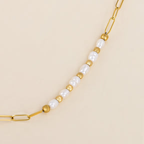 Collier avec initiales en forme de bulle dorée