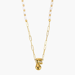 Collier avec initiales en forme de bulle dorée